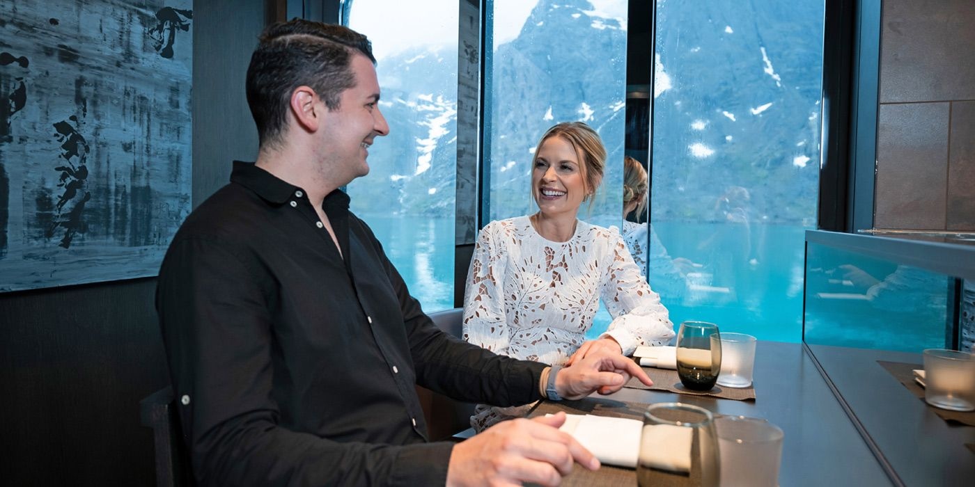Couple dining onboard Scenic Eclipse