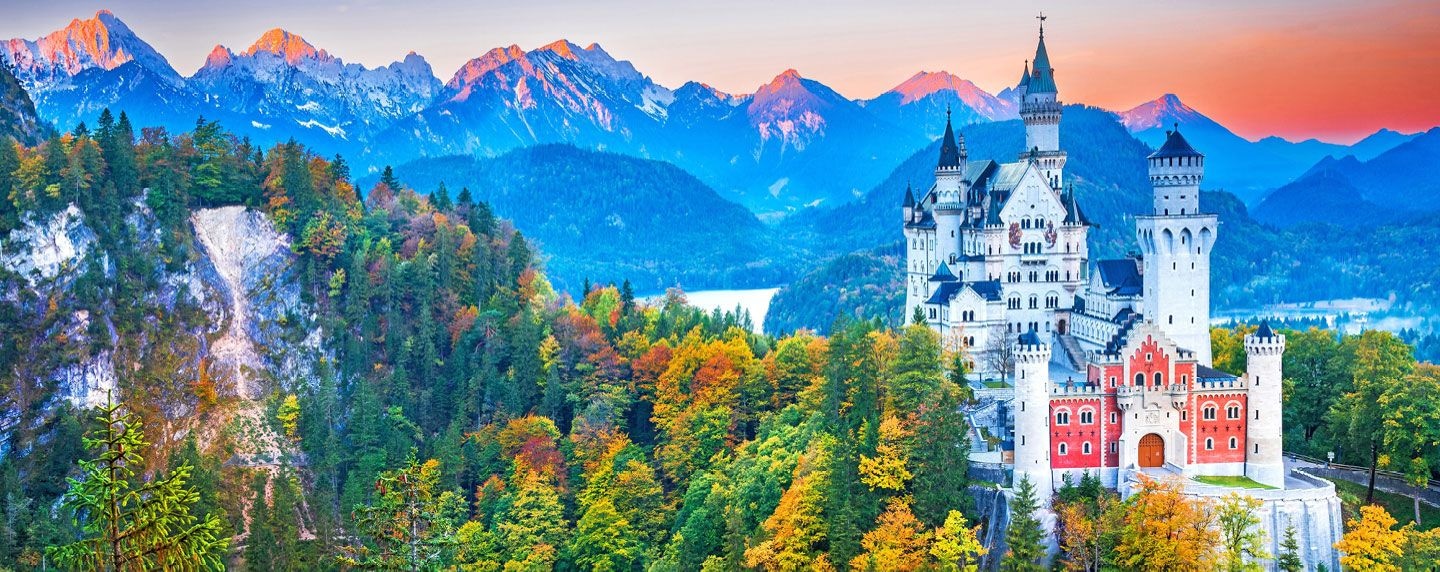 A castle surrounded by rugged mountain landscape